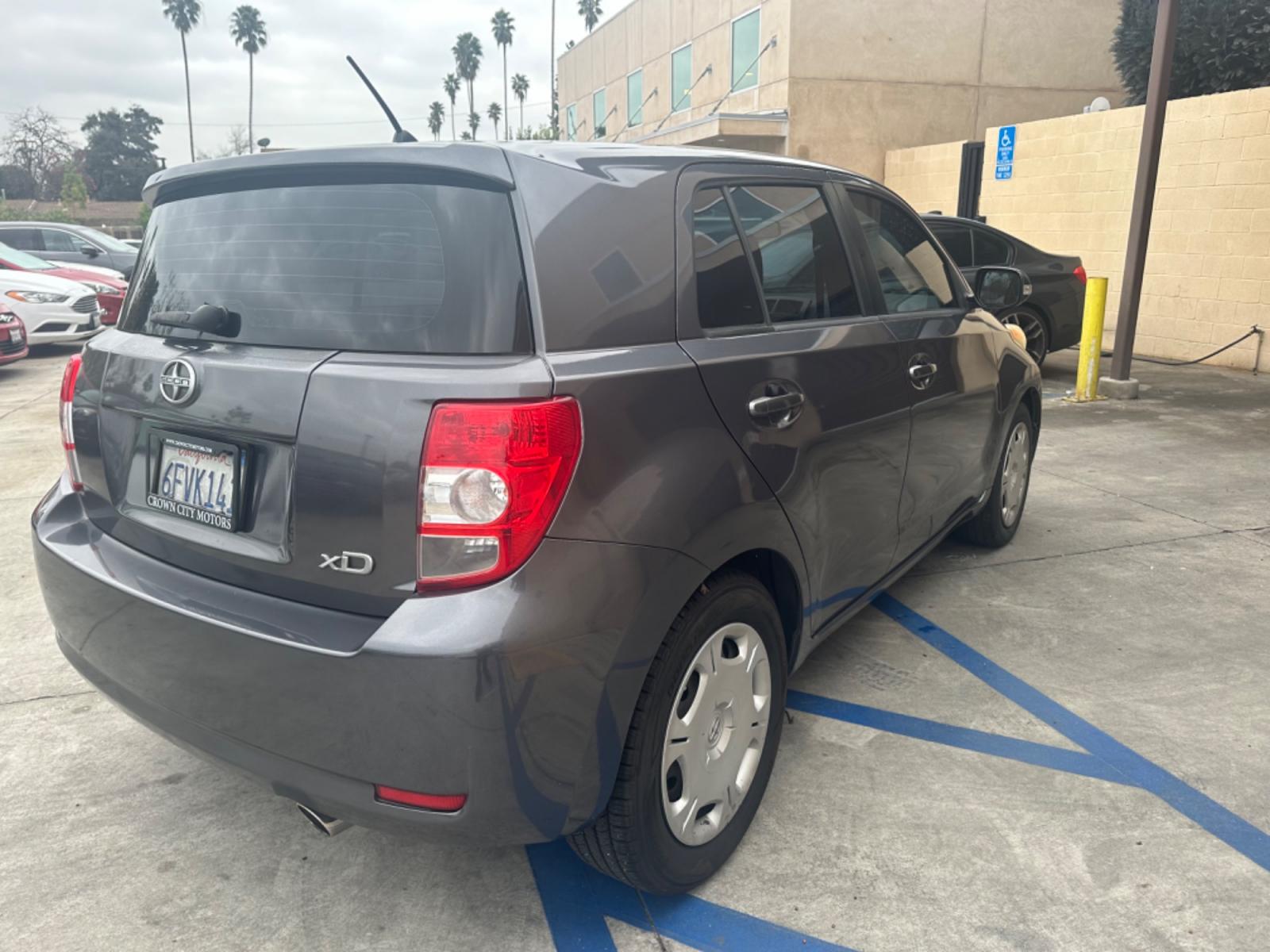 2009 Gray /Black Scion xD 5-Door (JTKKU104X9J) with an 1.8L L4 DOHC16V engine, automatic transmission, located at 30 S. Berkeley Avenue, Pasadena, CA, 91107, (626) 248-7567, 34.145447, -118.109398 - The 2009 Scion XD 4-Door Hatchback is a compact, versatile, and stylish vehicle that offers an exceptional driving experience. Located in the heart of Pasadena, CA, our dealership specializes in a comprehensive selection of used BHPH (Buy Here Pay Here) cars, including the dynamic Scion XD. This veh - Photo #8